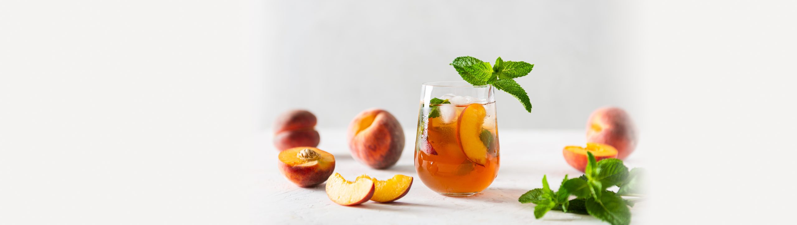 Refreshing,Iced,Tea,With,Ripe,Peaches,Banner.,Delicious,Peach,Iced